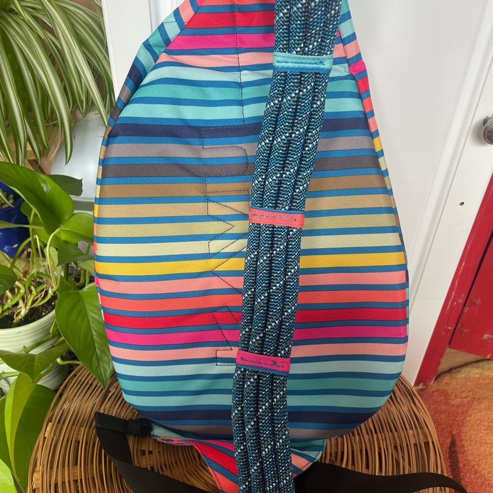 Kavu Rainbow Striped Sling Bag in Turquoise, Pink, Yellow, Navy, Brown - Picture 2 of 4